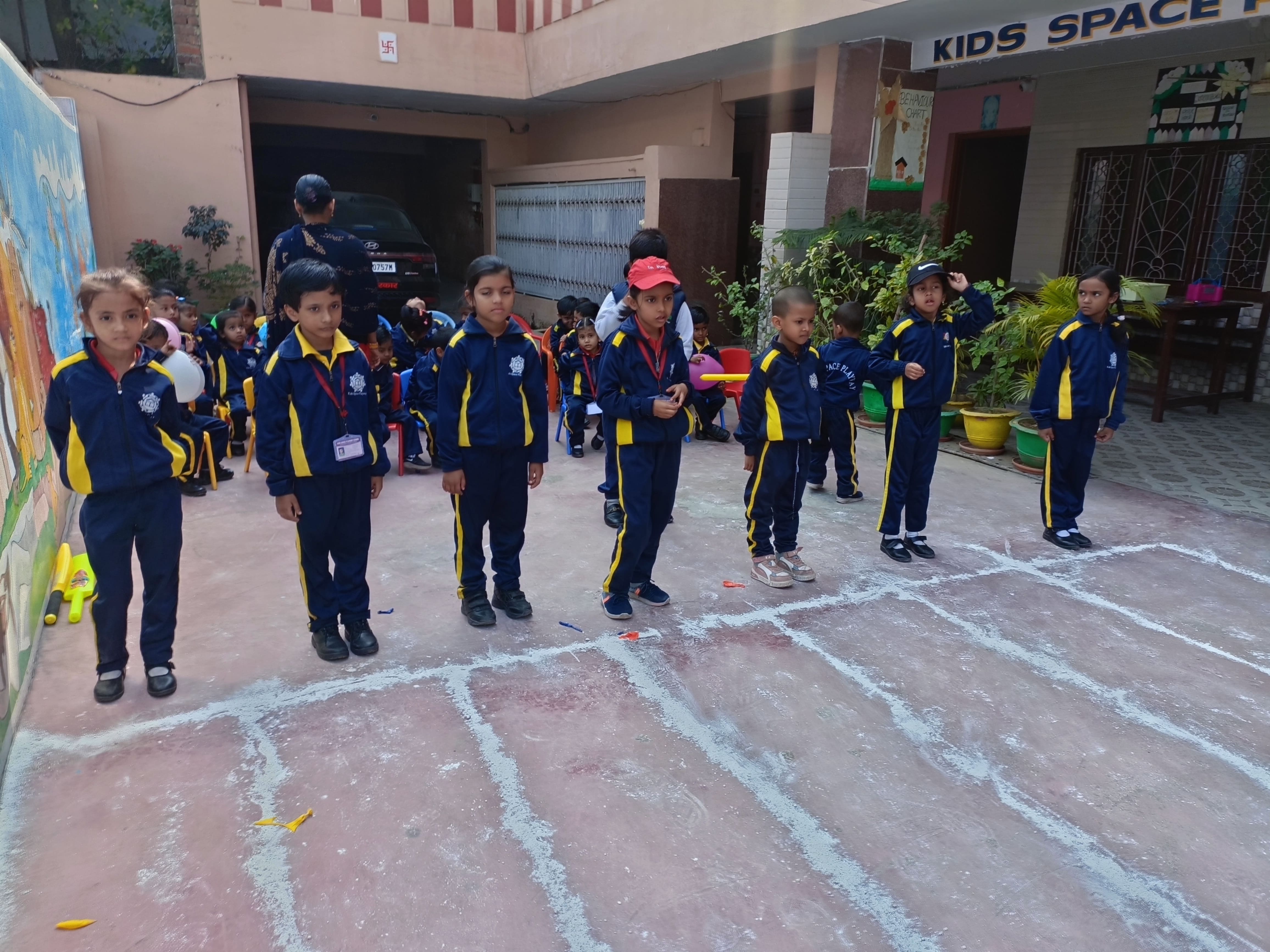 Children dancing and playing instruments